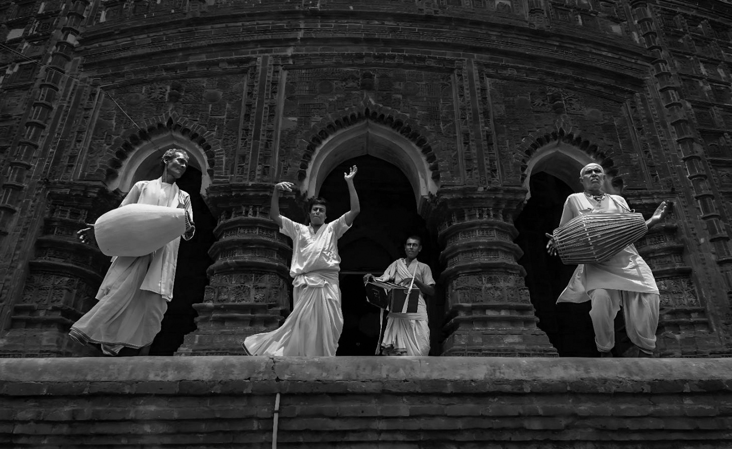 Ballet performance on stage showing precise technical form